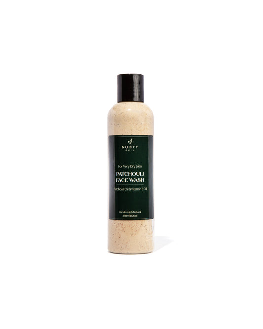 Patchouli Face Wash on a white background with minimal background, green label for eczema, dermatitis, and dry skin.